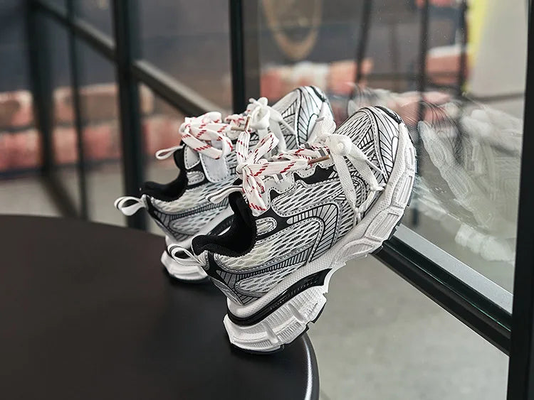Kids Sneakers Breathable Soft Sole Running Shoes for Boys and Girls in black and white design with red laces