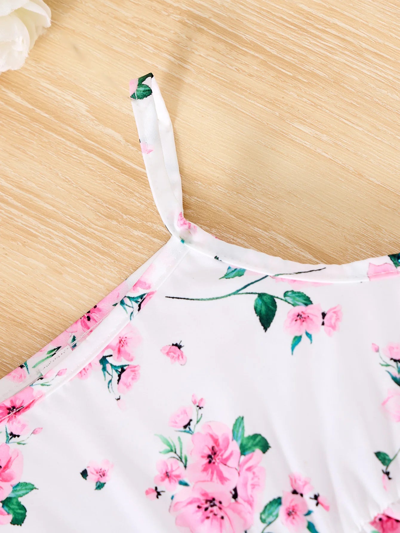 Children Casual Dress Girls Pink Knitted Top Floral Suspender Dress Summer Set with delicate pink flowers on white fabric