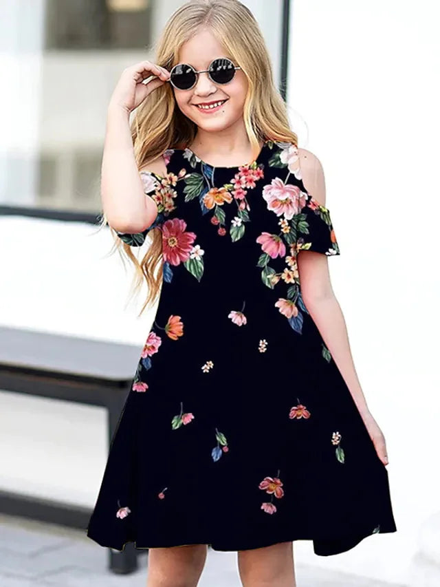 Children Clothing Flower Off Shoulder Round Neck Dress Short Sleeve Fashion in black with colorful floral print worn by girl