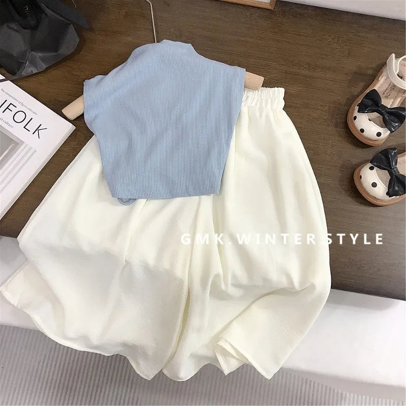 Children Clothing Sets Backless Sleeveless T-Shirt and Leg Pants Summer Outfit in light blue and white on wooden surface