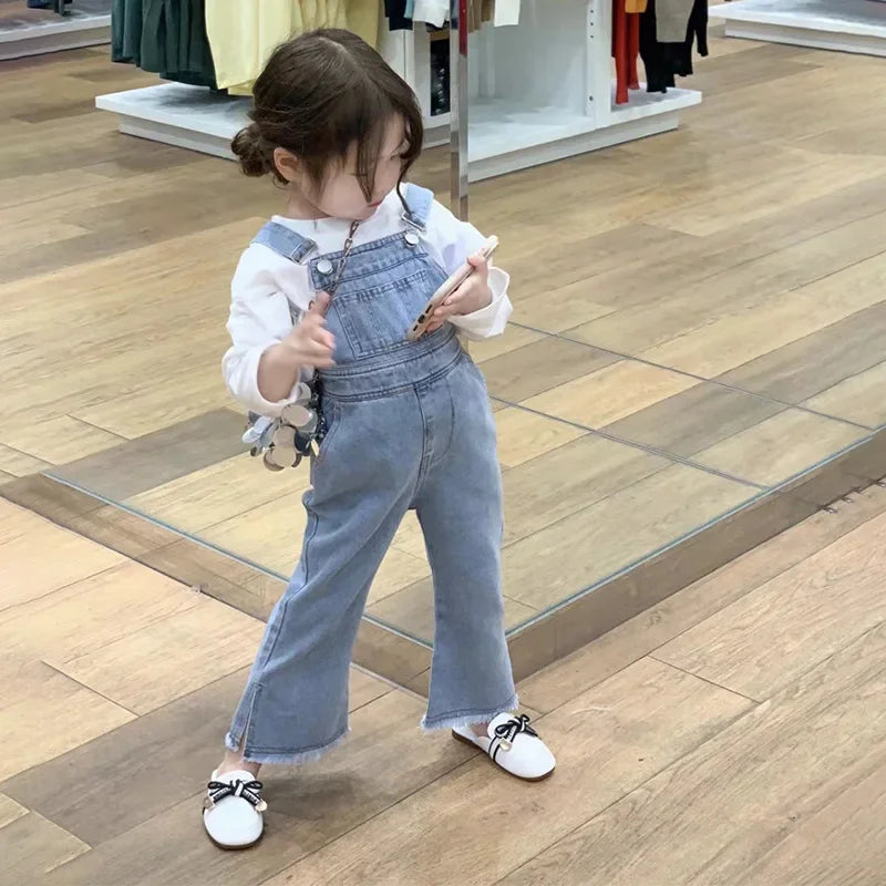 Children Clothing Sets Long Sleeve T Shirt Bow Suspenders Jeans Girls Baby Outfit in blue denim worn by toddler girl