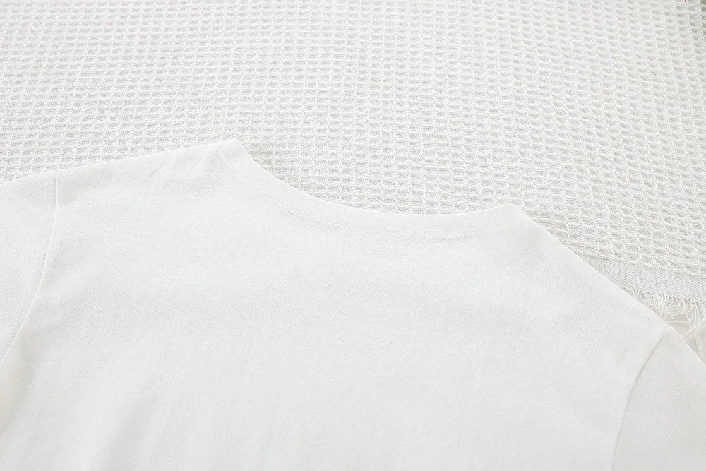 Close-up of white long sleeve t shirt as part of Children Clothing Sets Long Sleeve T Shirt Bow Suspenders Jeans Girls Baby Outfit