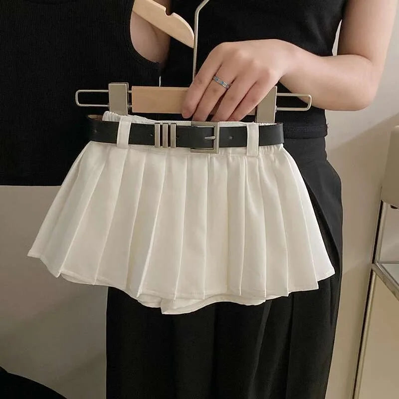 Children Clothing Sets Black Knitted Top and White Skirt Summer Outfit Kids Wear white pleated skirt with black belt held by person