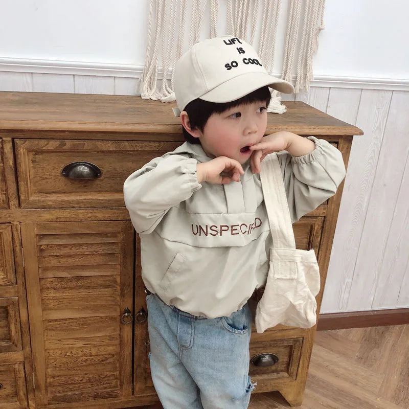 Children Fashion Hoodies Korean Style Autumn Spring Long Sleeve Kids Hooded Coat worn by a toddler in beige with a matching cap and tote bag