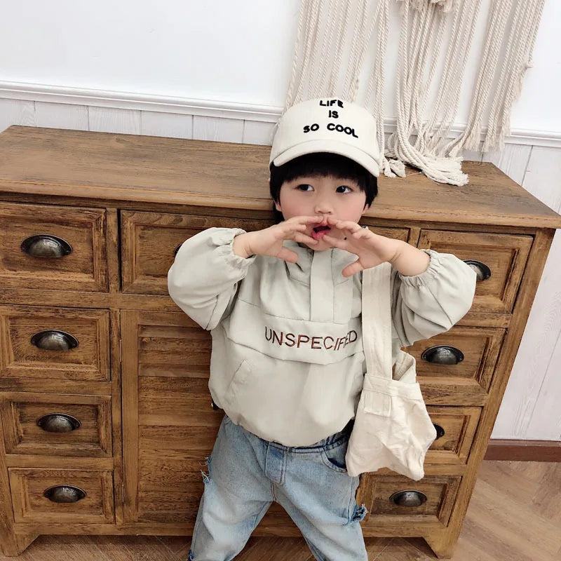 Child wearing Children Fashion Hoodies Korean Style Autumn Spring Long Sleeve Kids Hooded Coat in light grey with casual jeans and a white cap