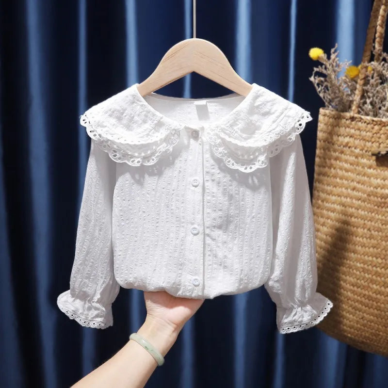 Children Girls Fashion T-shirts Lapel Blouse Breathable Top with Flared Sleeves in white hanging on wooden hanger