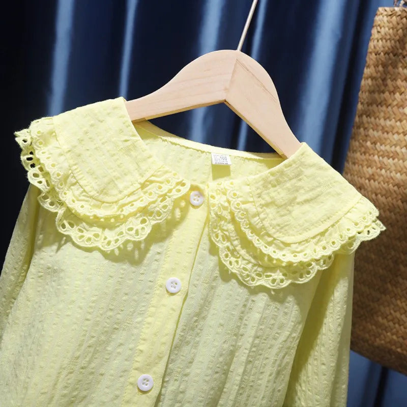 Children Girls Fashion T-shirts Lapel Blouse Breathable Top with Flared Sleeves in light yellow hanging on wooden hanger