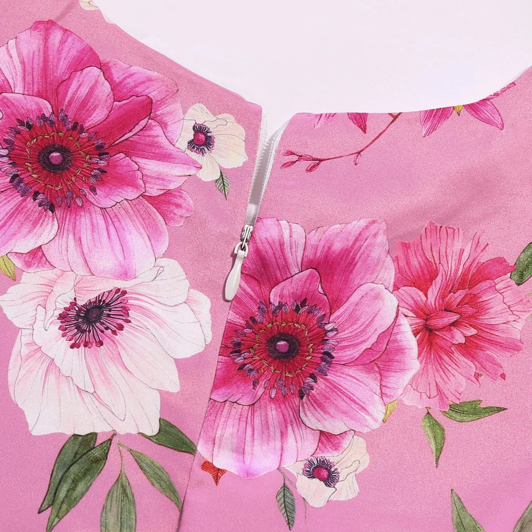 Children Summer Flower Print Dress with Flying Sleeves and Bowknot Detail close-up of pink floral fabric and zipper