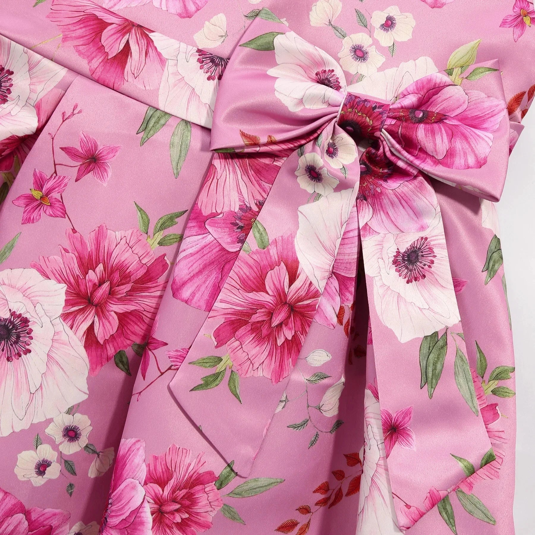 Children Summer Flower Print Dress with Flying Sleeves and Bowknot Detail in pink with vibrant floral design