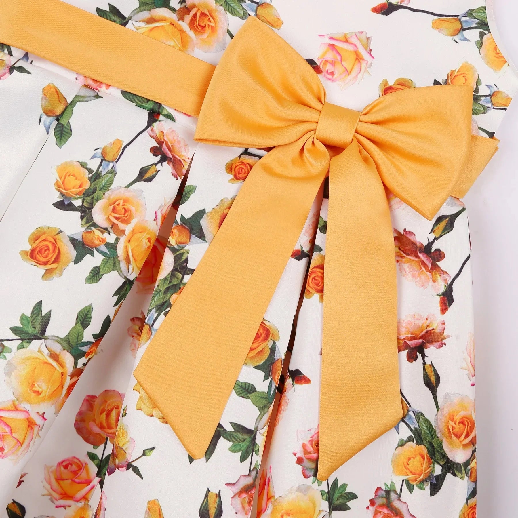 Children Summer Flower Print Dress with Flying Sleeves and Bowknot Detail featuring yellow floral pattern and large yellow bow