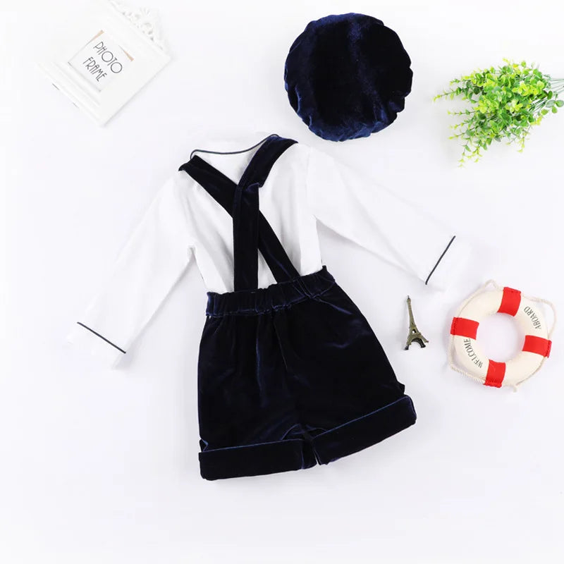 Newborn Baby Boy Clothes Suit Birthday Wedding Velvet Pants Blouse 3Pcs Set with navy velvet pants, suspenders, white long sleeve blouse, and matching hat