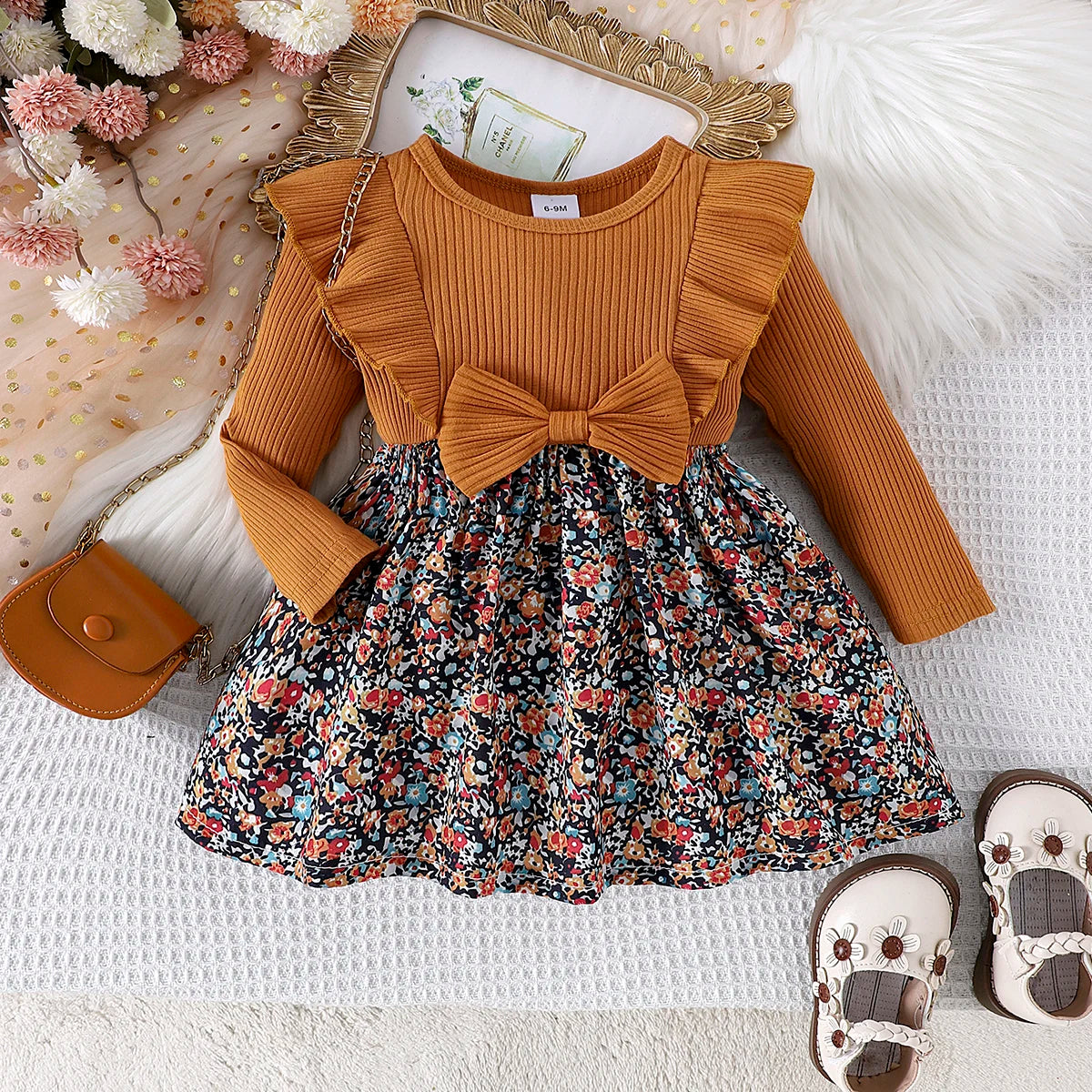 Comfortable fashionable baby girl dress with long sleeve ribbed top and floral skirt by Yamza Tots' Closet