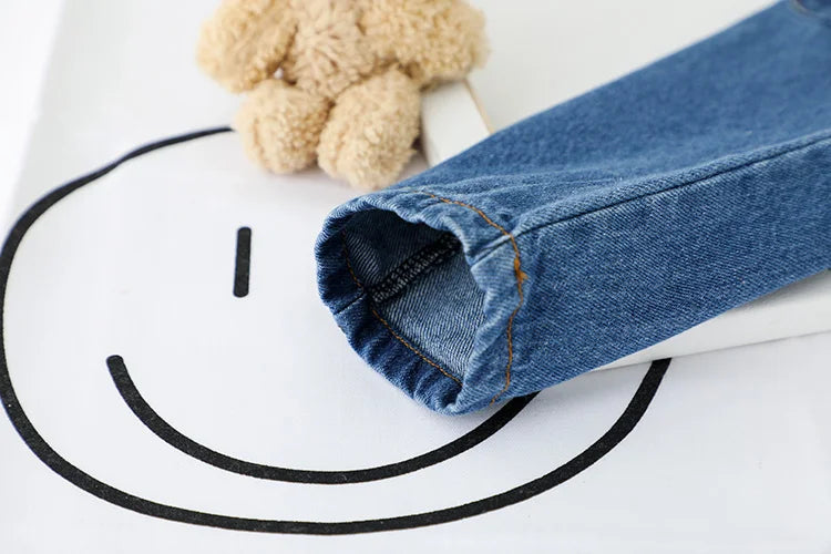 Close-up of denim overalls sleeve from Cute Baby Clothes Set Casual T-shirt with Bib Denim Overalls for Kids
