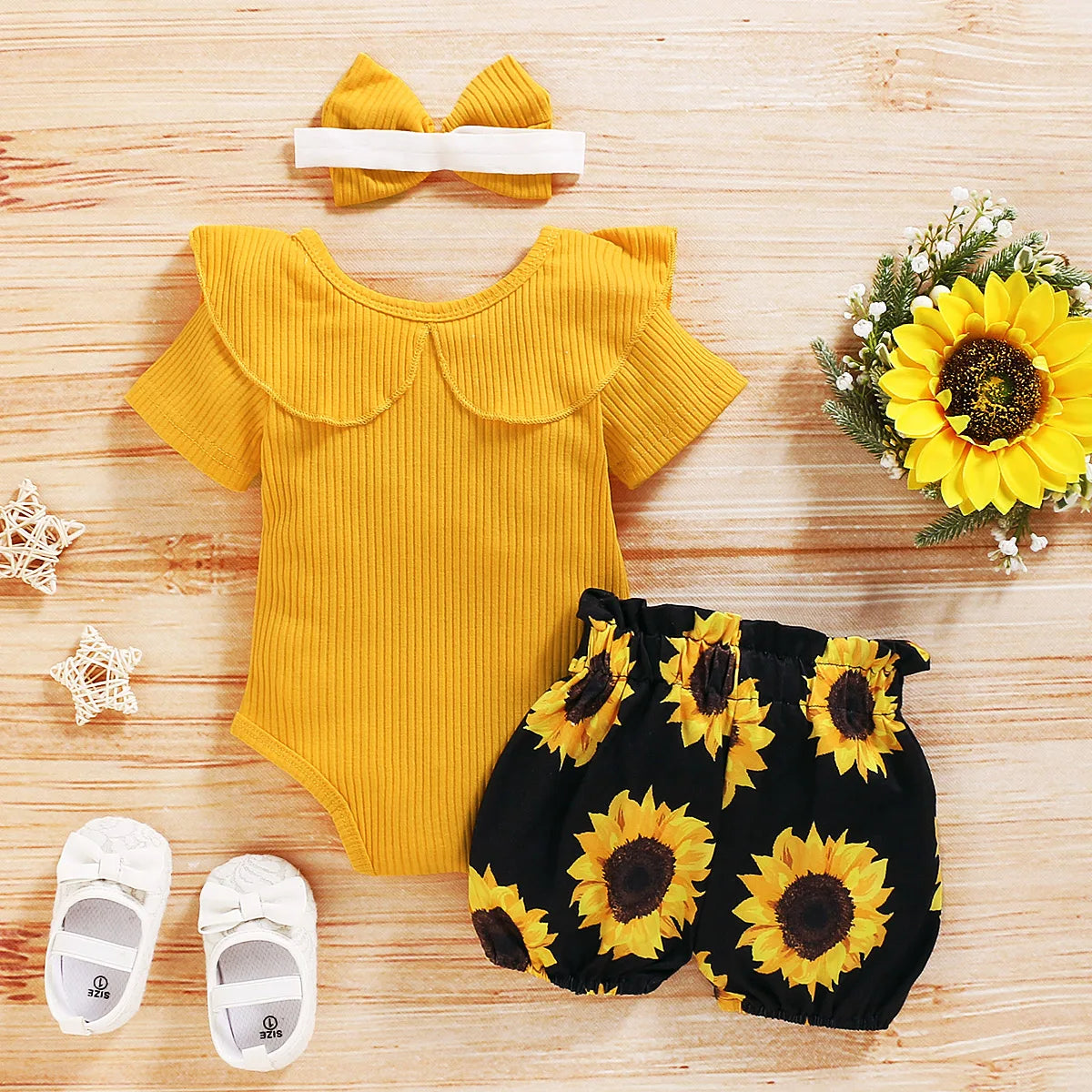 Cute Baby Girl Clothing Set Yellow Romper Top and Sunflower Printed Shorts with matching headband and white shoes 