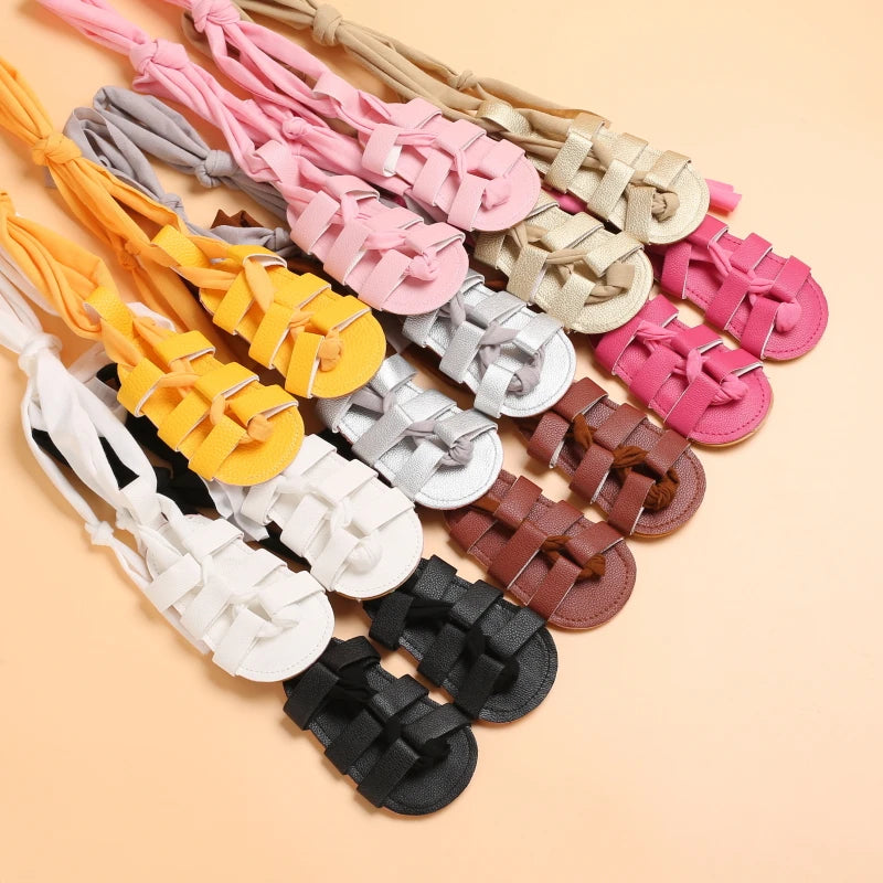 Cute Baby Girls Strap Sandals with Soft Rubber Sole Comfortable Summer Shoes in various colors including pink white black brown and yellow