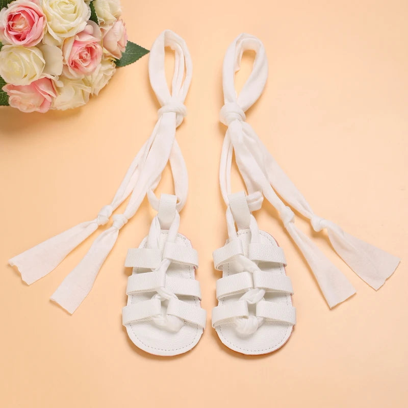 Cute Baby Girls Strap Sandals with Soft Rubber Sole Comfortable Summer Shoes in white with tie strapsss