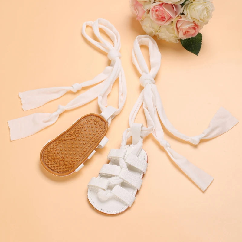 Cute Baby Girls Strap Sandals with Soft Rubber Sole Comfortable Summer Shoes in white with tie straps