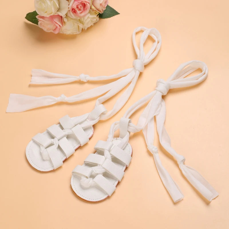 Cute Baby Girls Strap Sandals with Soft Rubber Sole Comfortable Summer Shoes in white with bow ties