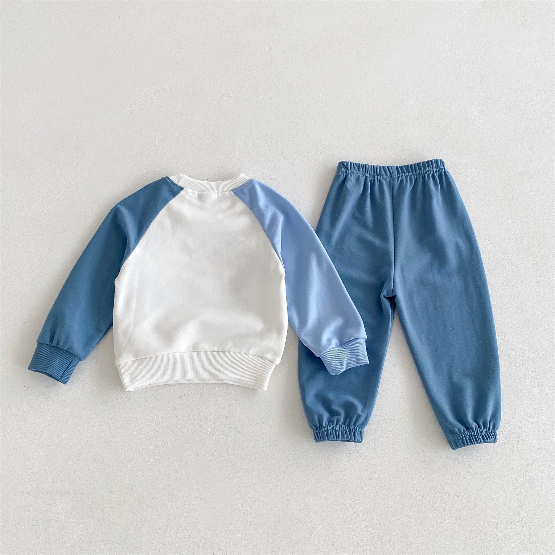 Yamza Tots' Closet Disney Cartoon Tracksuit with white and blue color-blocked top and blue elastic waist pants