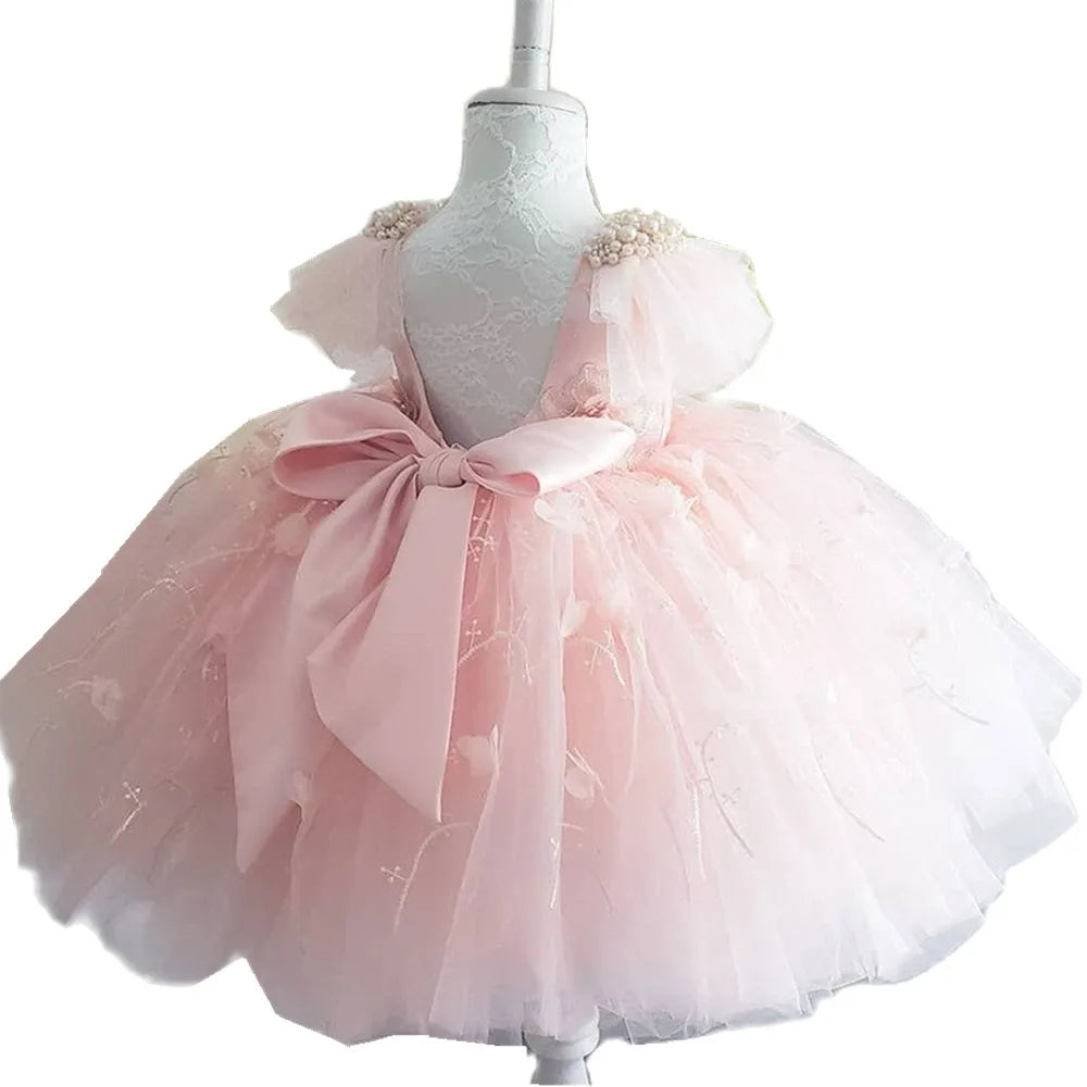 Elegant Girl Dress Pink with layered tulle skirt and large bow at back perfect for special occasions