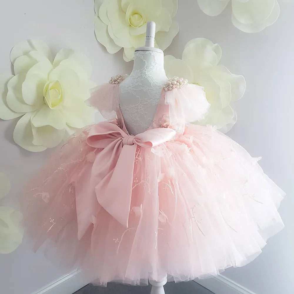 Elegant Girl Dress Pink with tulle skirt and bow detail by Yamza Tots' Closet on mannequin