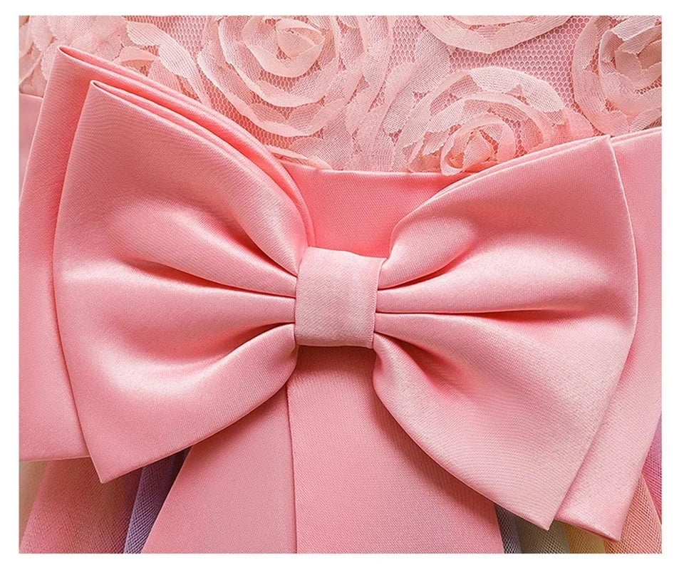 Close-up of a pink satin bow detail on an Elegant Rainbow Girls Party Dress Princess Style Wedding Prom Gown