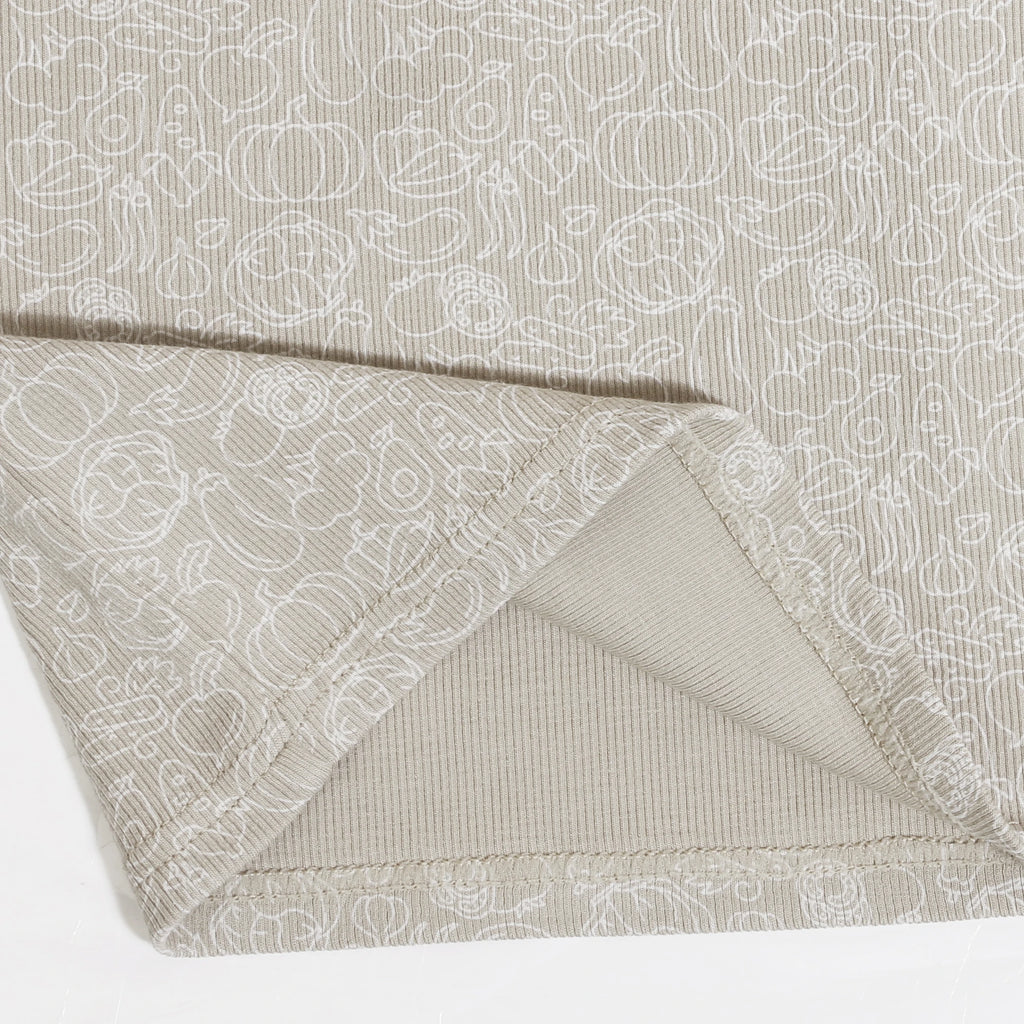 Yamza Tots' Closet beige fabric close-up showing Family Ribbed Print Sets for Summer and Spring pattern details