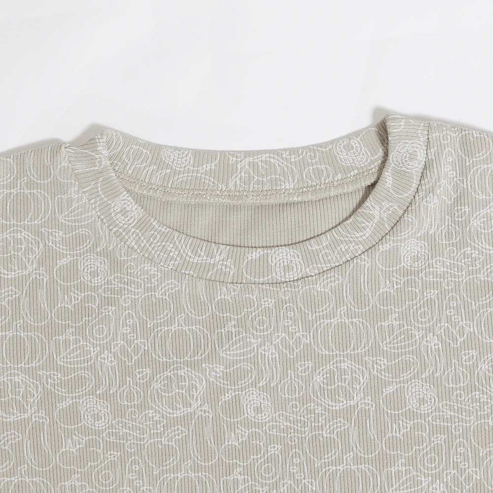 Close-up of beige Family Ribbed Print Sets for Summer and Spring with subtle white patterns
