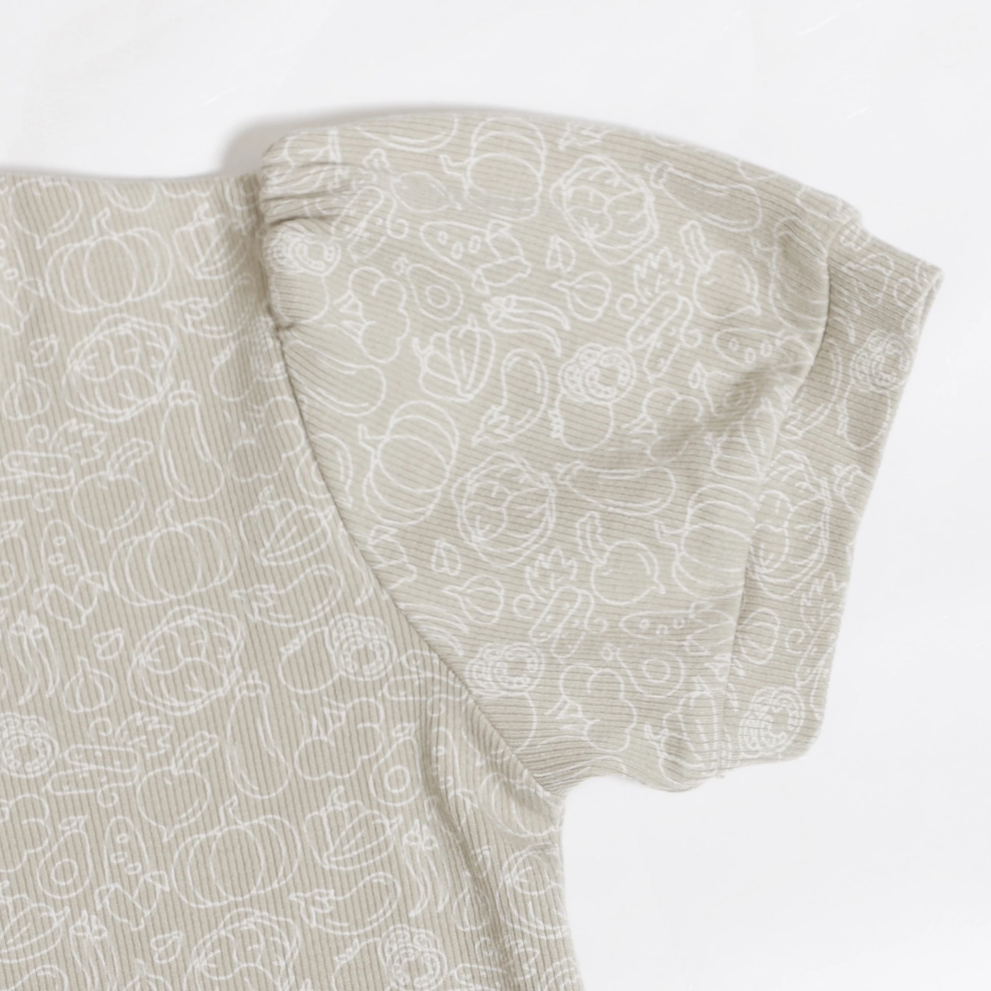 Close-up of beige Family Ribbed Print Sets for Summer and Spring with white vegetable patterns and puff sleeves