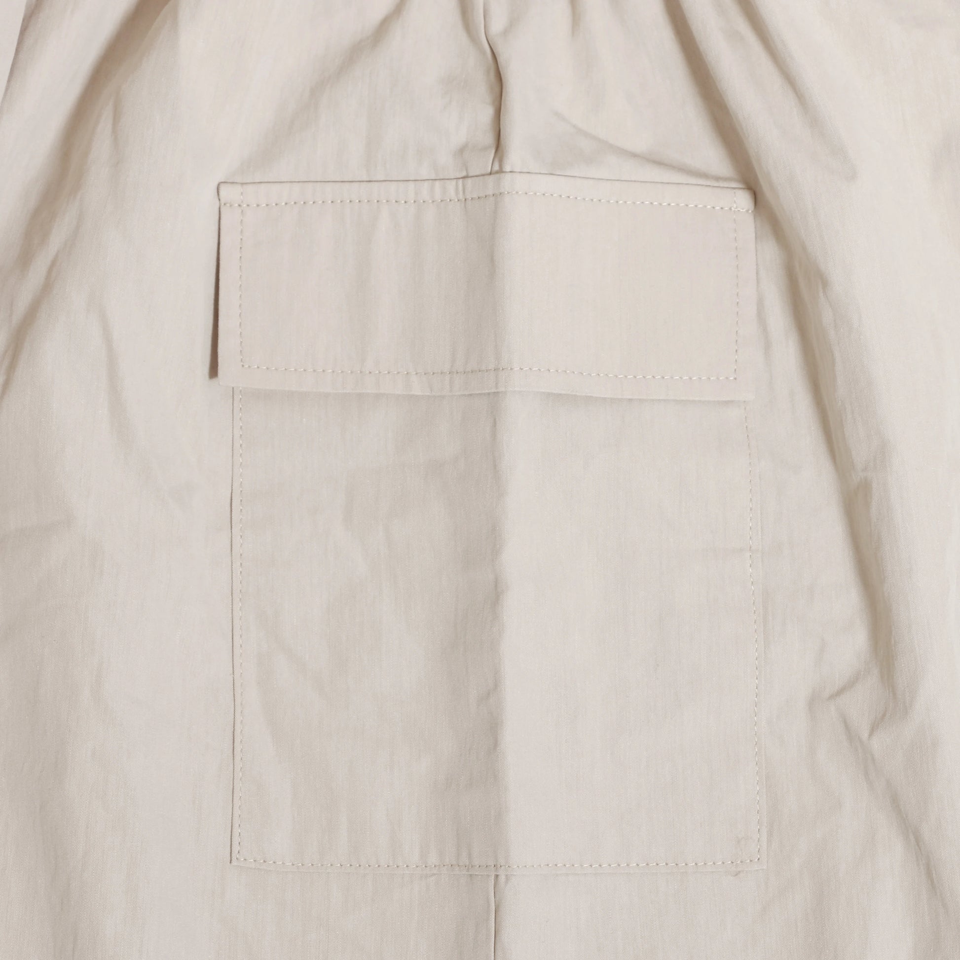 Close-up of beige fabric pocket detail on Family Ribbed Print Sets for Summer and Spring by Yamza Tots' Closet