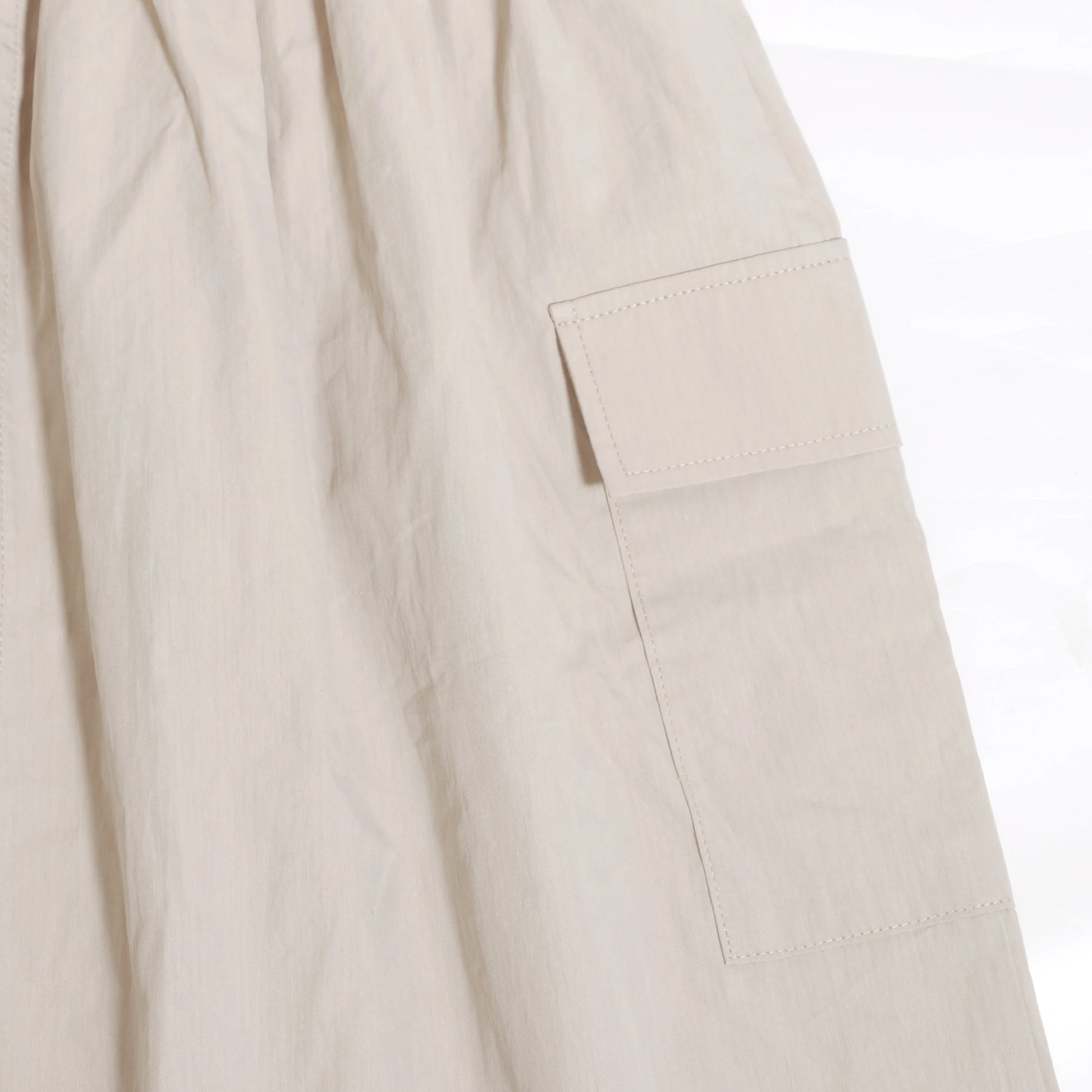 Close-up of beige fabric pocket detail on Family Ribbed Print Sets for Summer and Spring