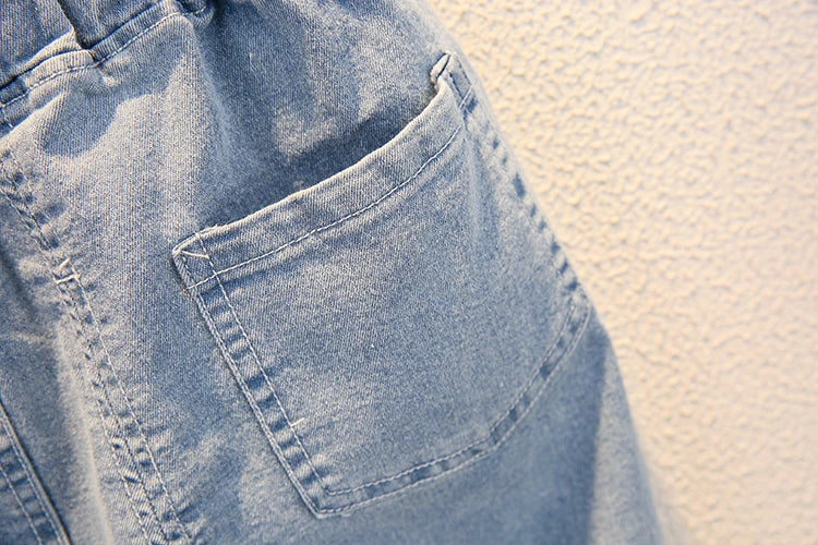 Close-up of denim shorts pocket on Fashion Baby Boys T Shirt and Denim Shorts Summer Set Casual Kids Outfit