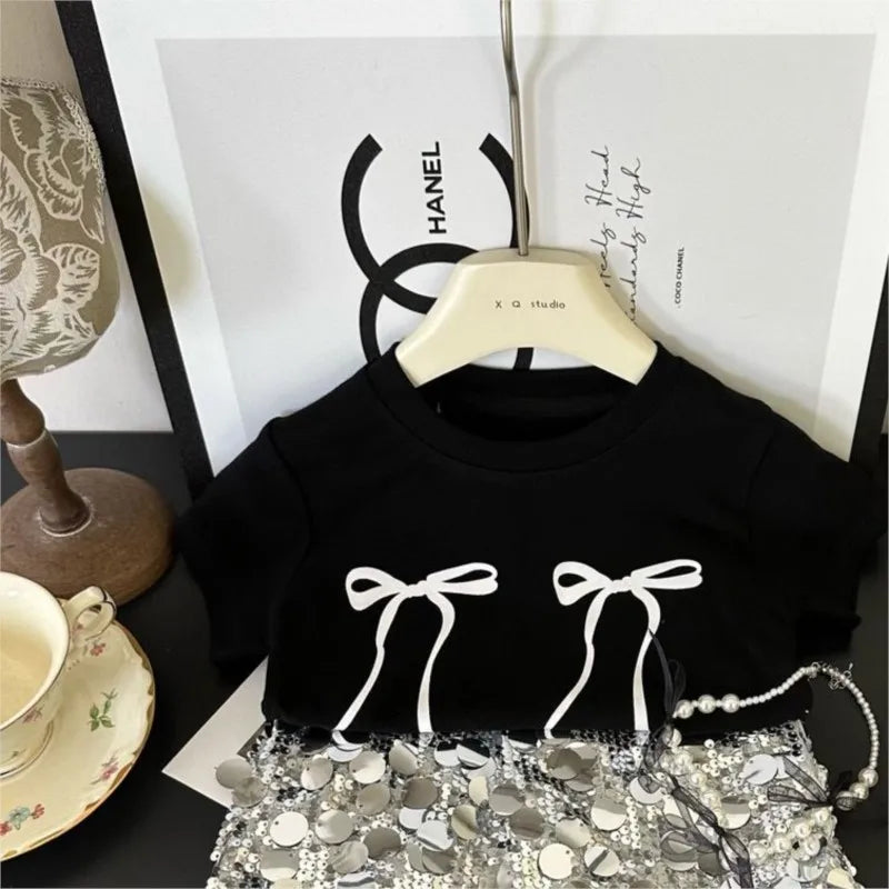 Fashion Baby Girl Bow T Shirt and Sequin Skirt Set Sparkle Kids Outfit in black with white bow design