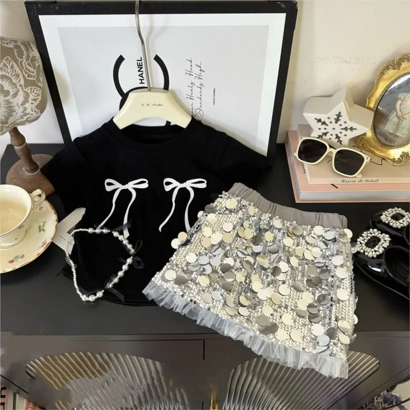 Fashion Baby Girl Bow T Shirt and Sequin Skirt Set Sparkle Kids Outfit by Yamza Tots Closet displayed with accessories
