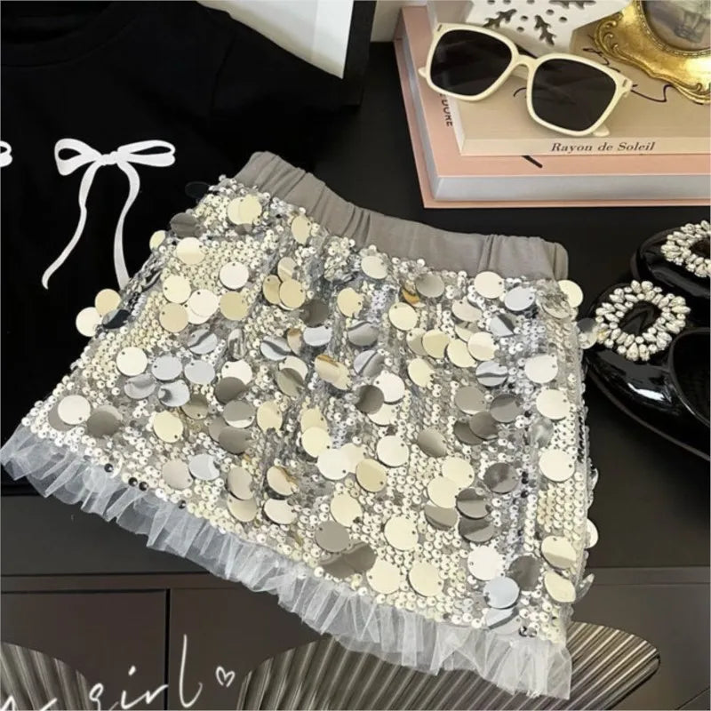 Fashion Baby Girl Bow T Shirt and Sequin Skirt Set Sparkle Kids Outfit by Yamza Tots' Closet with glittery silver skirt and black bow t shirt