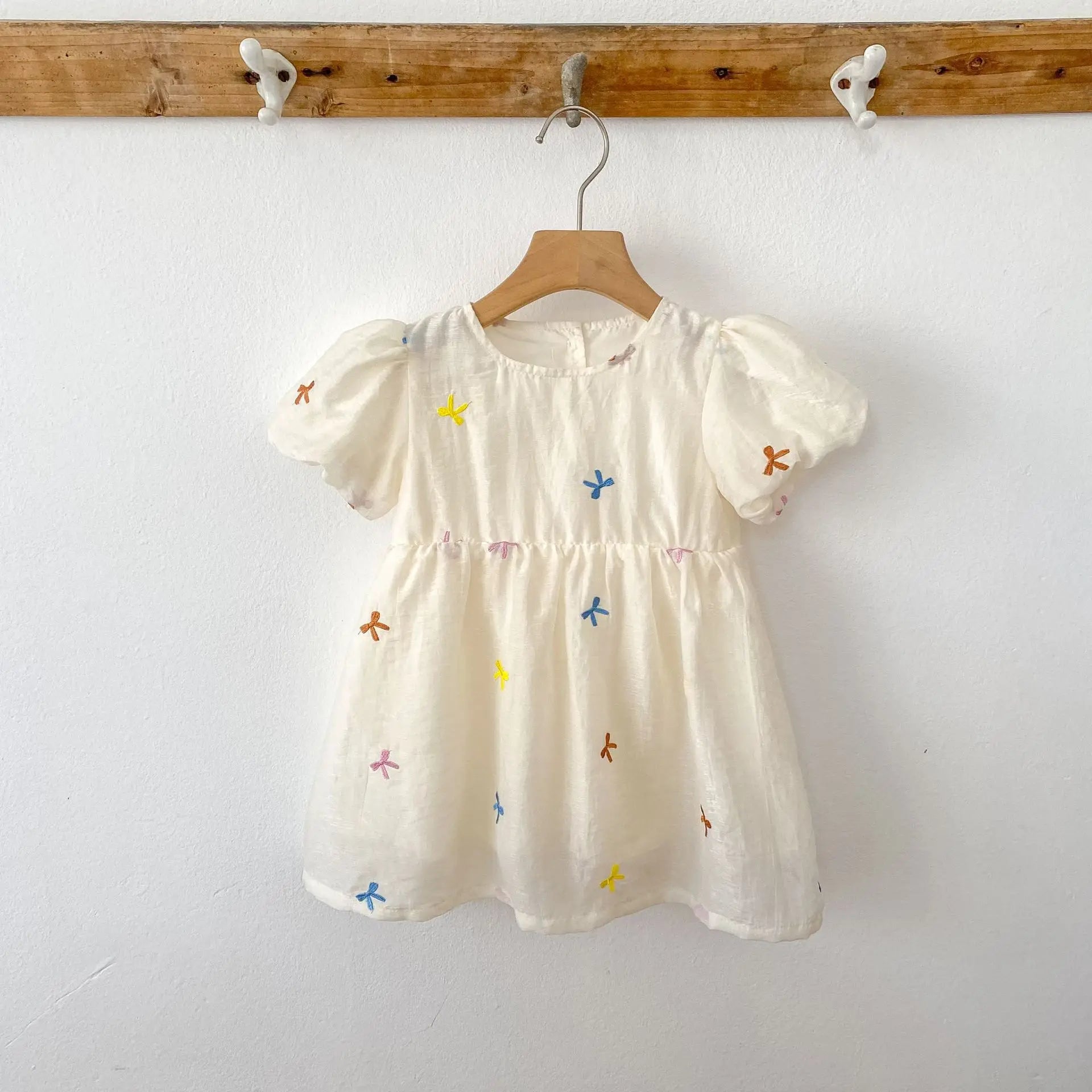 Fashion Baby Girls Embroidered Bow Puff Sleeve Cotton Backless Princess Dress in white with colorful embroidery