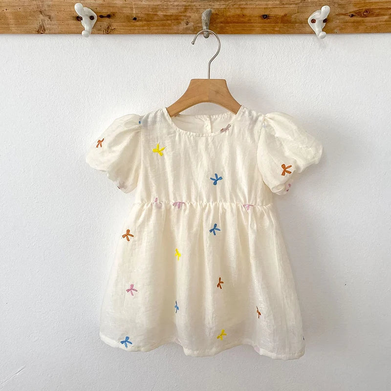 Fashion Baby Girls Embroidered Bow Puff Sleeve Cotton Backless Princess Dress in white with colorful bow embroidery