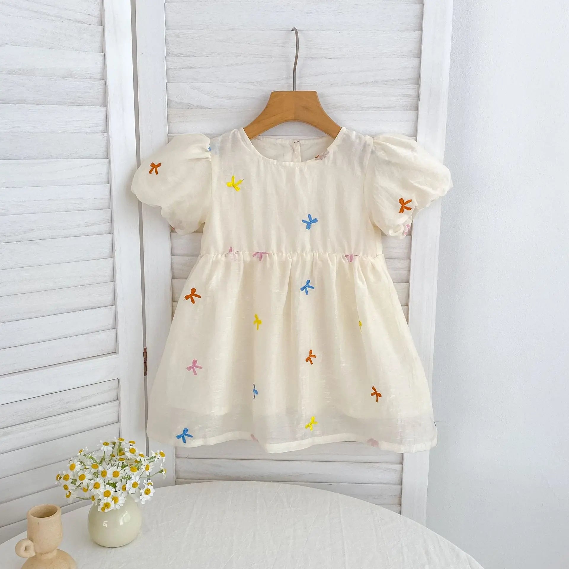 Fashion Baby Girls Embroidered Bow Puff Sleeve Cotton Backless Princess Dress in cream with colorful embroidery 