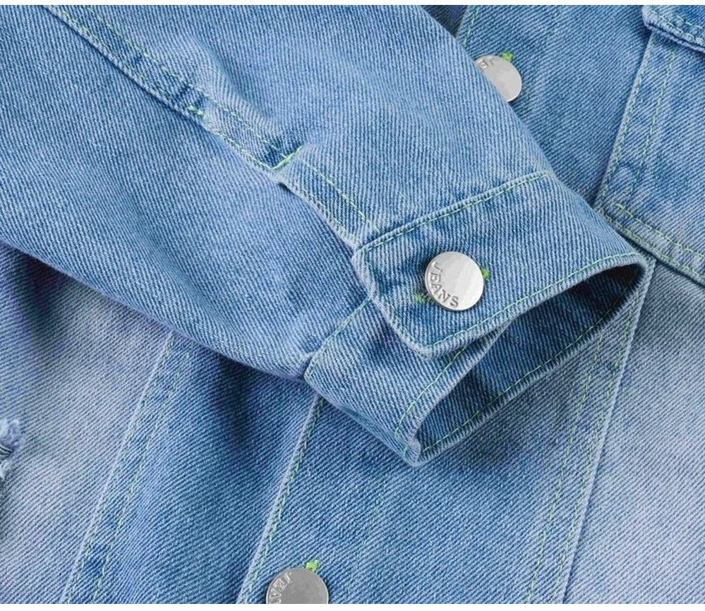 Close-up of blue denim jacket sleeve with silver button detail Fashion Baby Girls Hello Kitty Kuromi Denim Jacket Coat Spring Autumn Wear