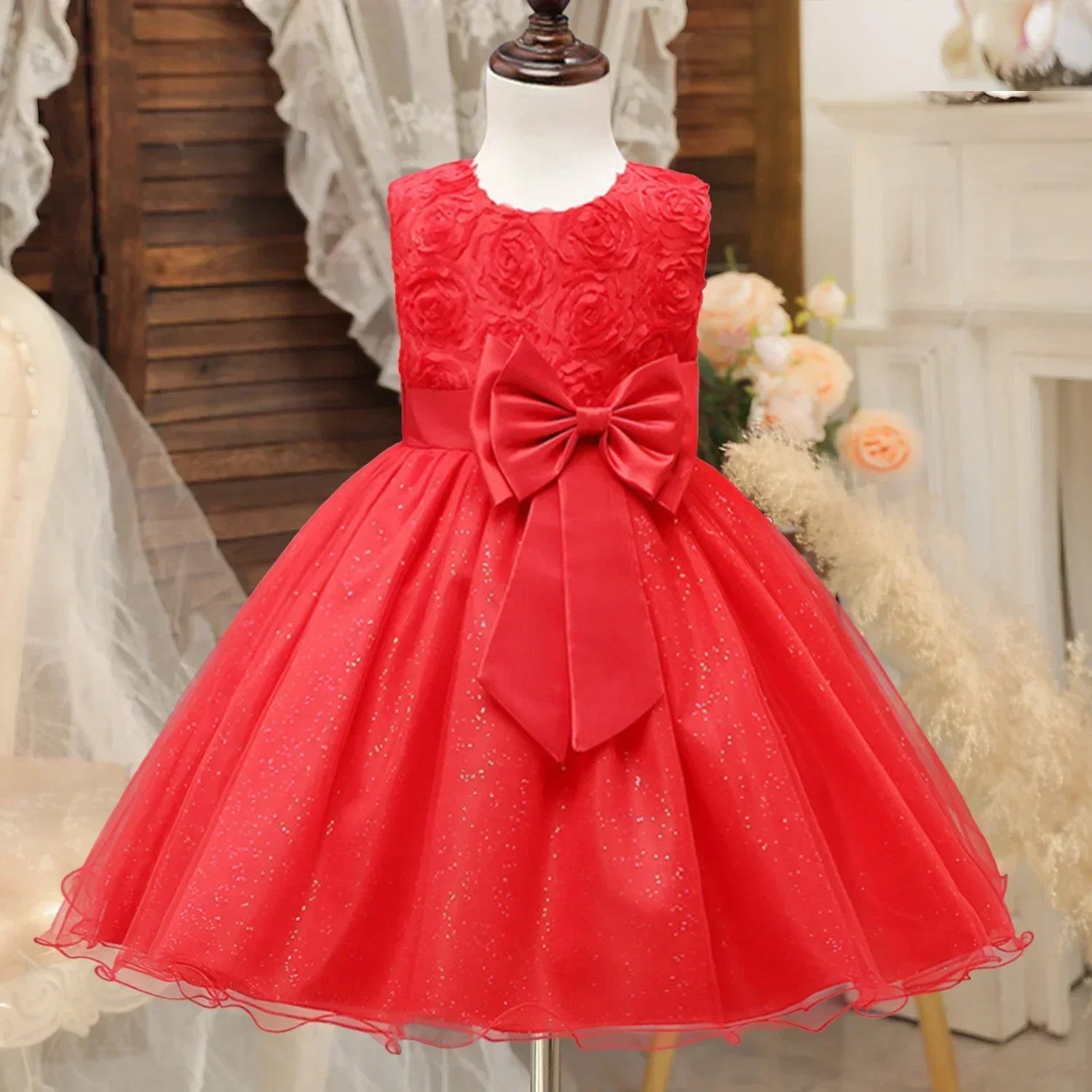 Fashion Girl Royal Blue Mesh Sleeveless Evening Gown Party Dress Kids Summer styled in vibrant red with floral bodice and large bow
