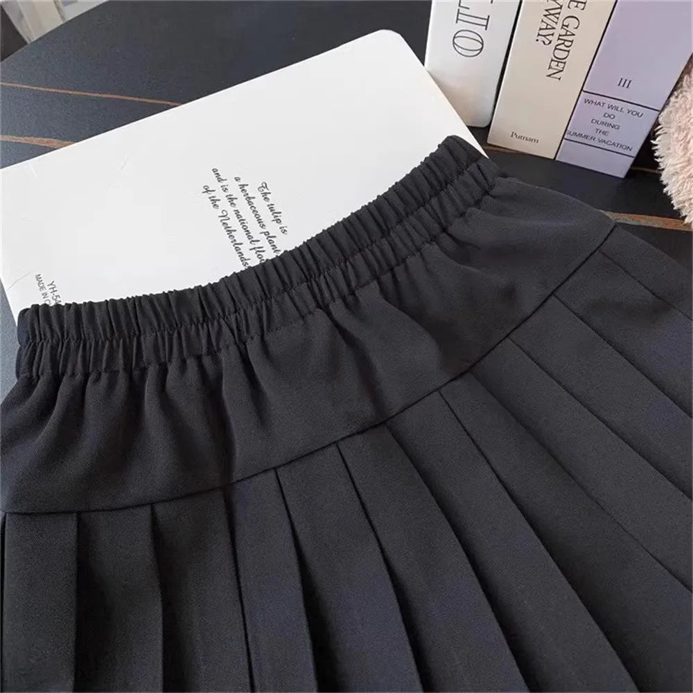 Fashion Girls Clothing Summer Casual Little Girls Solid Color High Waist Skirt in black with pleated design