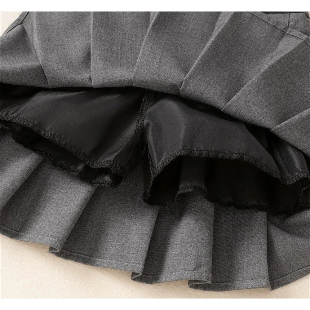 Fashion Girls Clothing Summer Casual Little Girls Solid Color High Waist Skirt gray pleated fabric close-up