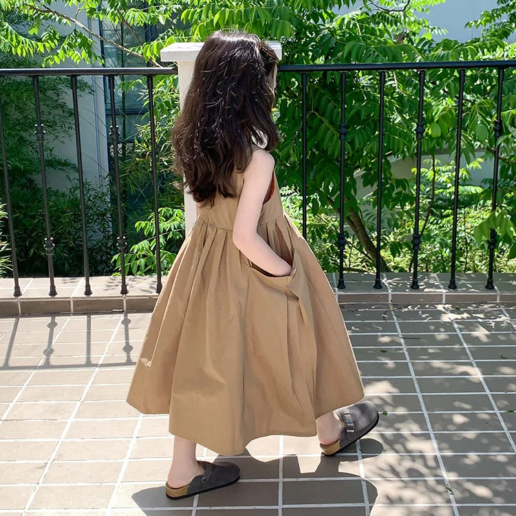 Fashion Girls Cotton Large Skirt Fairy Dress Summer Kids Sleeveless Korean Style in tan color worn outdoors