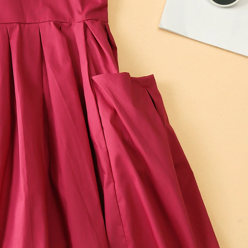 Fashion girls cotton large skirt fairy dress summer kids sleeveless Korean style in deep pink fabric close up