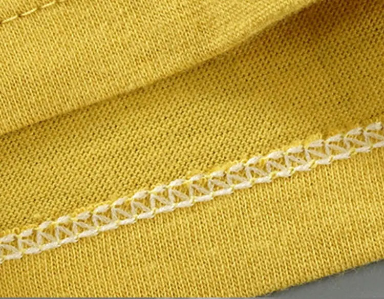 Close-up of yellow fabric stitching in Fashion Kids Clothes Set Top Shorts 2PCS Cotton Soft Summer Suit