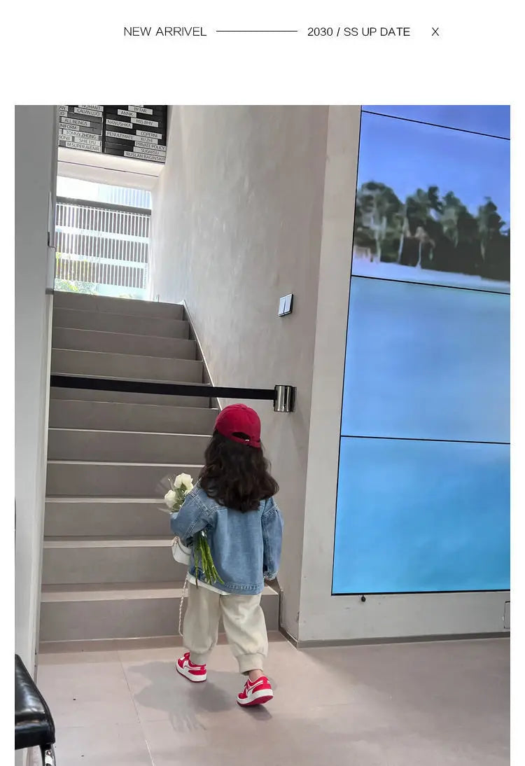 Fashion Kids Denim Jacket Girls Spring Autumn Casual Coat Children Outerwear worn by child walking indoors holding flowers