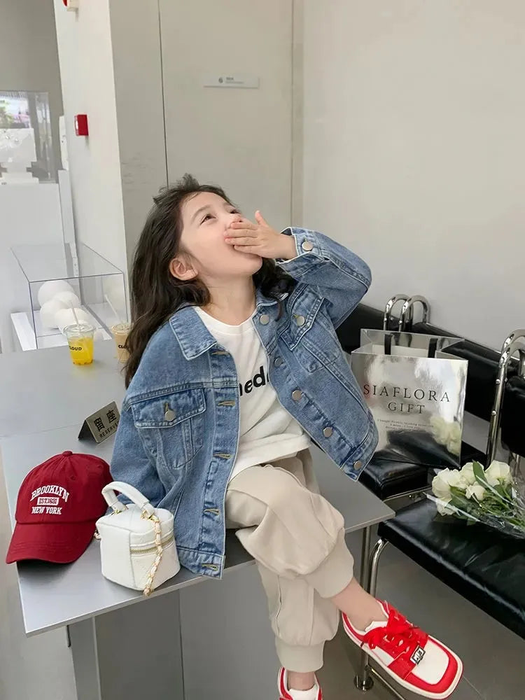 Fashion Kids Denim Jacket Girls Spring Autumn Casual Coat Children Outerwear worn by a girl sitting indoors with stylish casual outfit