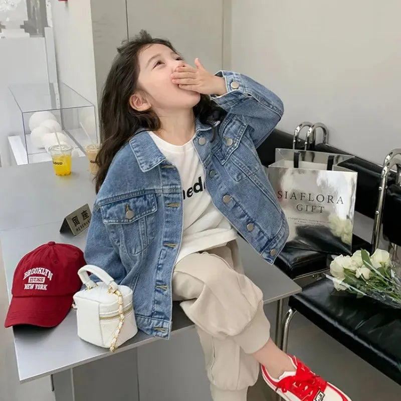Fashion Kids Denim Jacket Girls Spring Autumn Casual Coat Children Outerwear worn by girl sitting indoors with white bag and red shoes