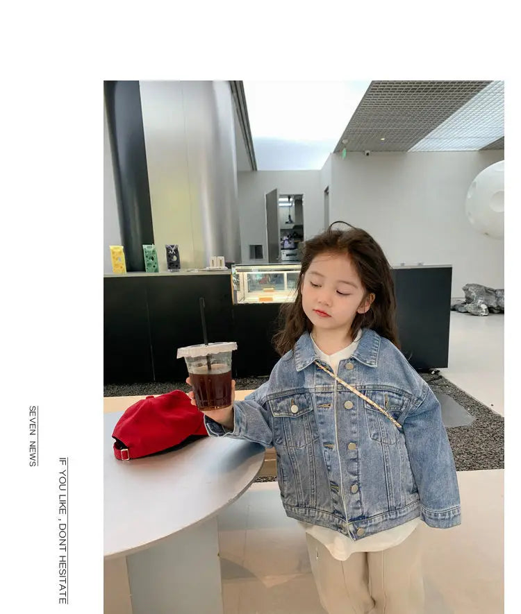 Fashion Kids Denim Jacket Girls Spring Autumn Casual Coat Children Outerwear worn by girl holding drink indoors