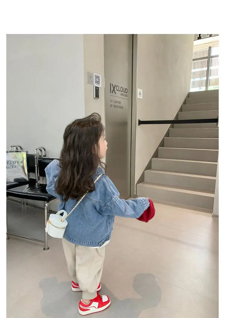 Fashion Kids Denim Jacket Girls Spring Autumn Casual Coat Children Outerwear worn by toddler girl with red shoes and white bag indoors